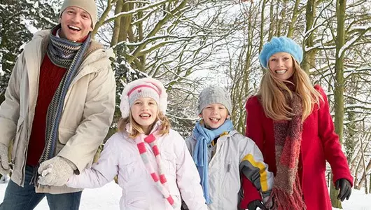 family on winter hike