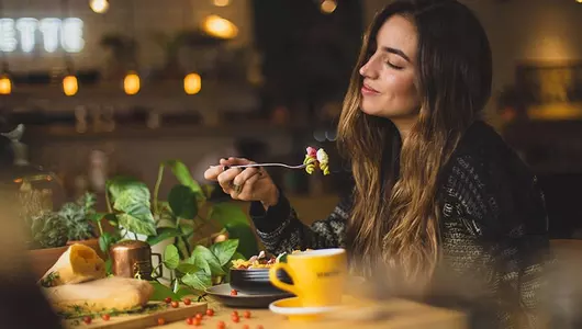 woman enjoying a meal