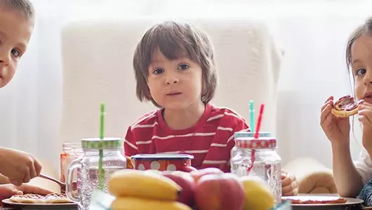 children eating at table